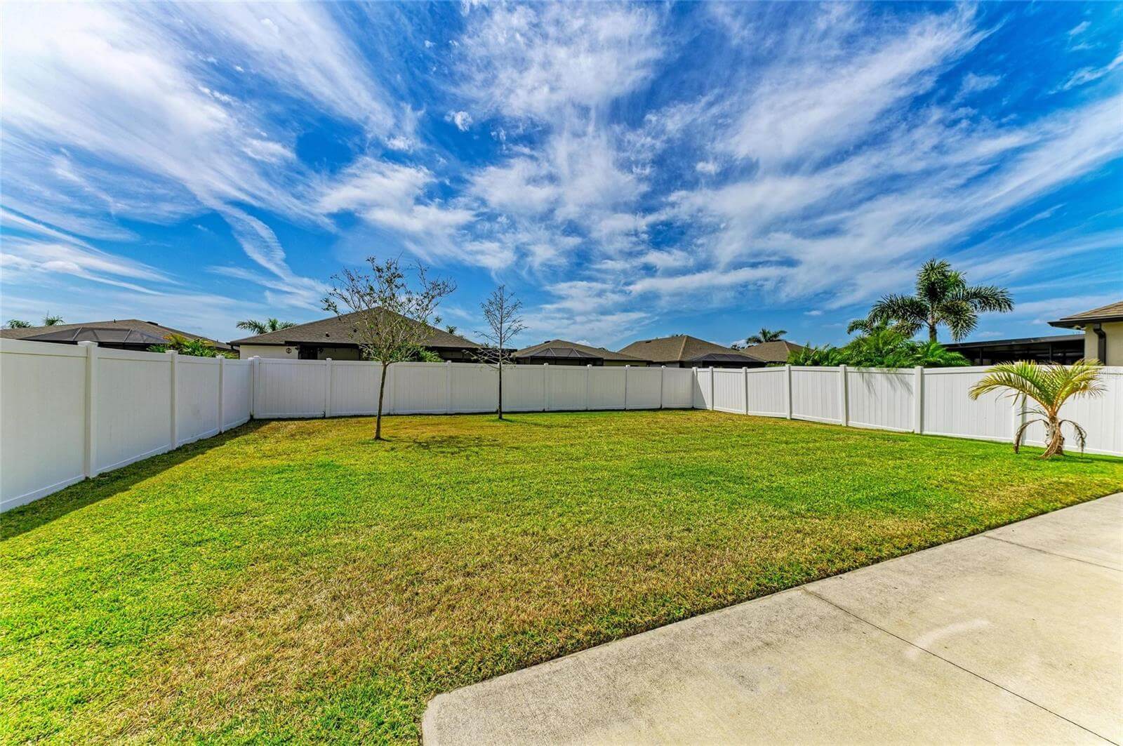 Backyard and patio space in Villa Milano rental home, Port Charlotte