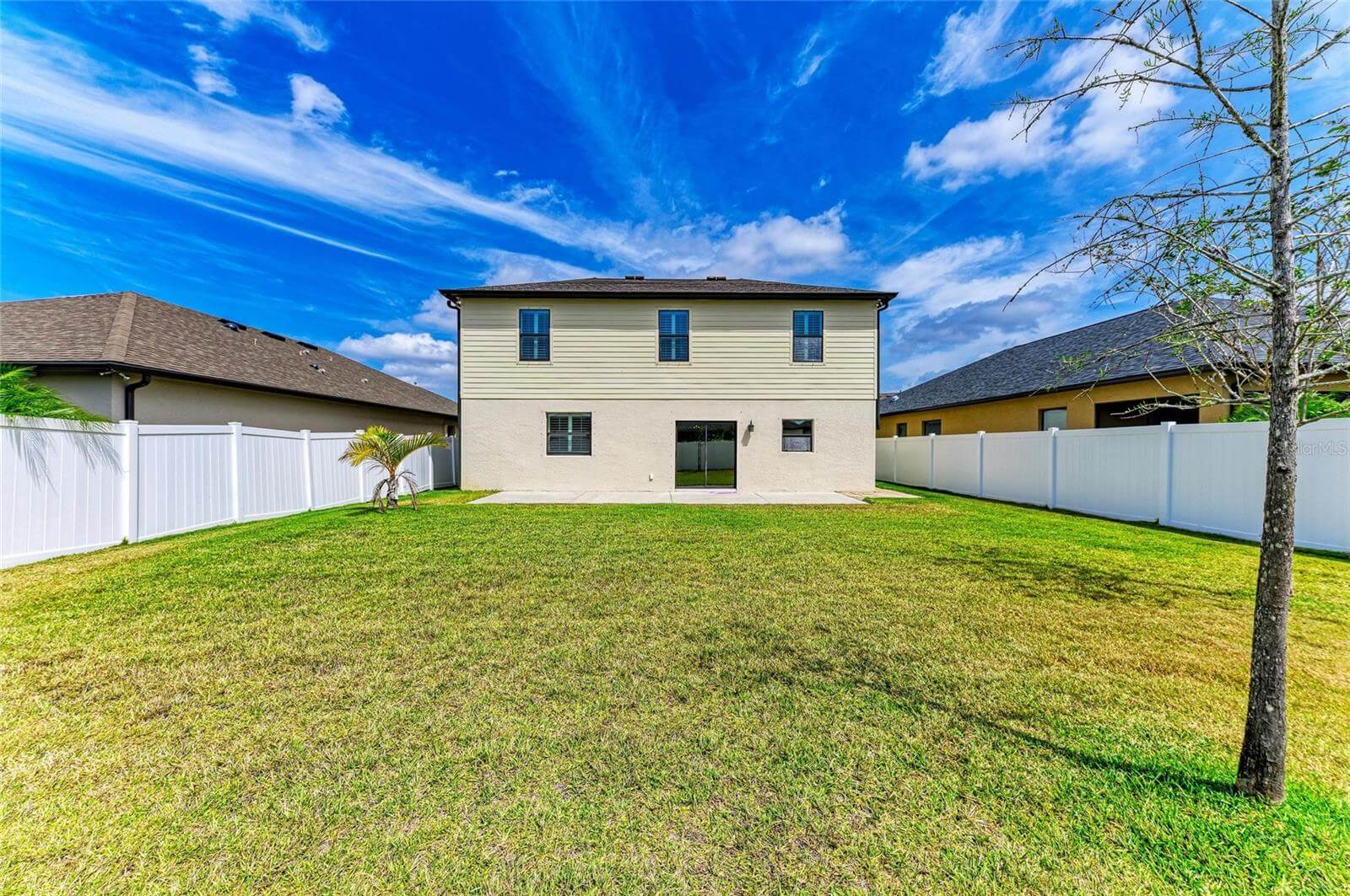 Backyard and patio space in Villa Milano rental home, Port Charlotte