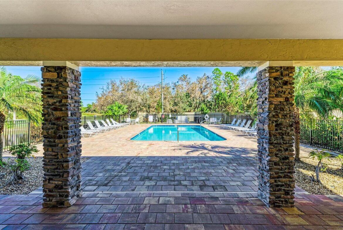 Villa Milano gated community pool and lounge area in Port Charlotte, Florida