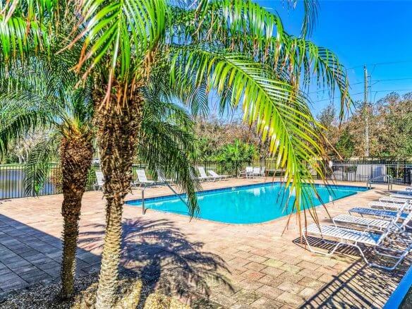Villa Milano gated community pool and lounge area in Port Charlotte, Florida