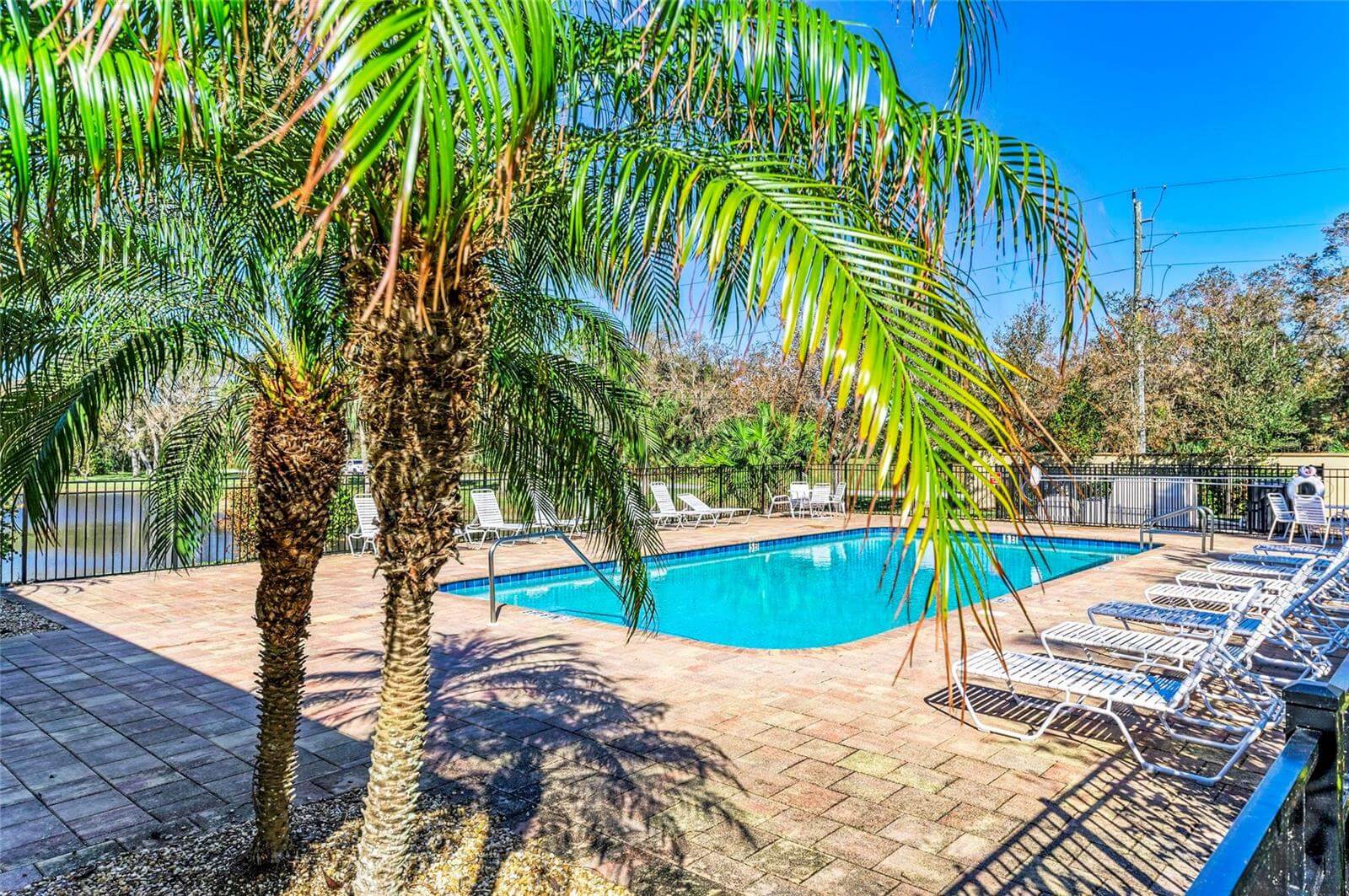 Villa Milano gated community pool and lounge area in Port Charlotte, Florida